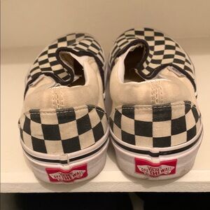Vans Black and White Checkerboard Slip-On Sneakers